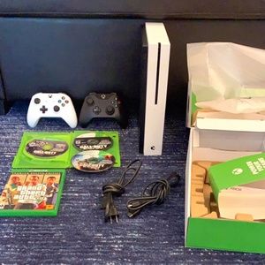 Xbox One S (with) 2 controllers, 4 Games, 2 Cords, and Box